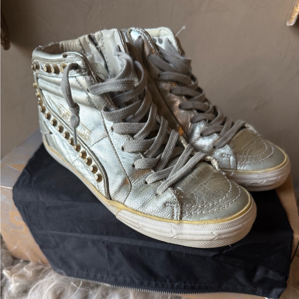 Golden Goose slide sneakers in silver leather with gold/brass studs. Size35
